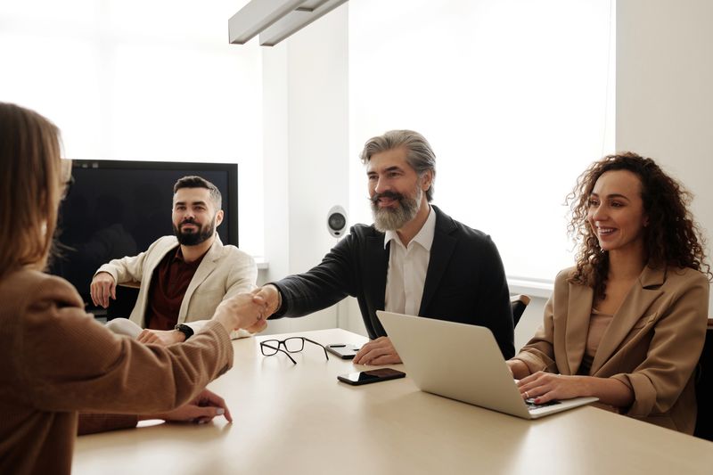 People meeting around a table. Stock photography.